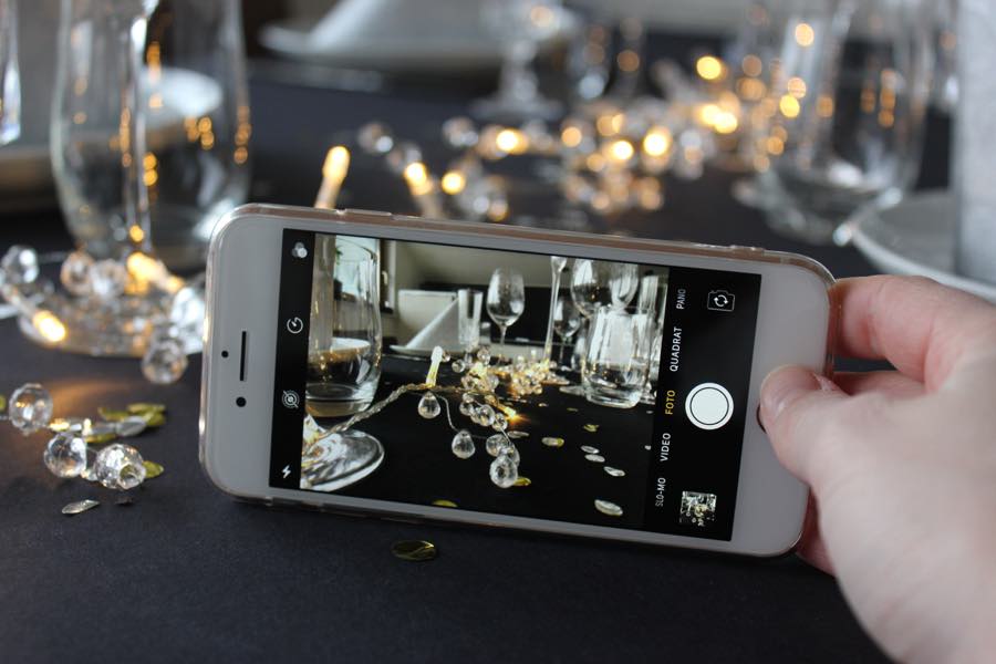 smartphone and wine glasses